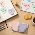 A transparent pearlescent heart-shaped sticky notes from Arenzza, designed for note-taking and decoration.
