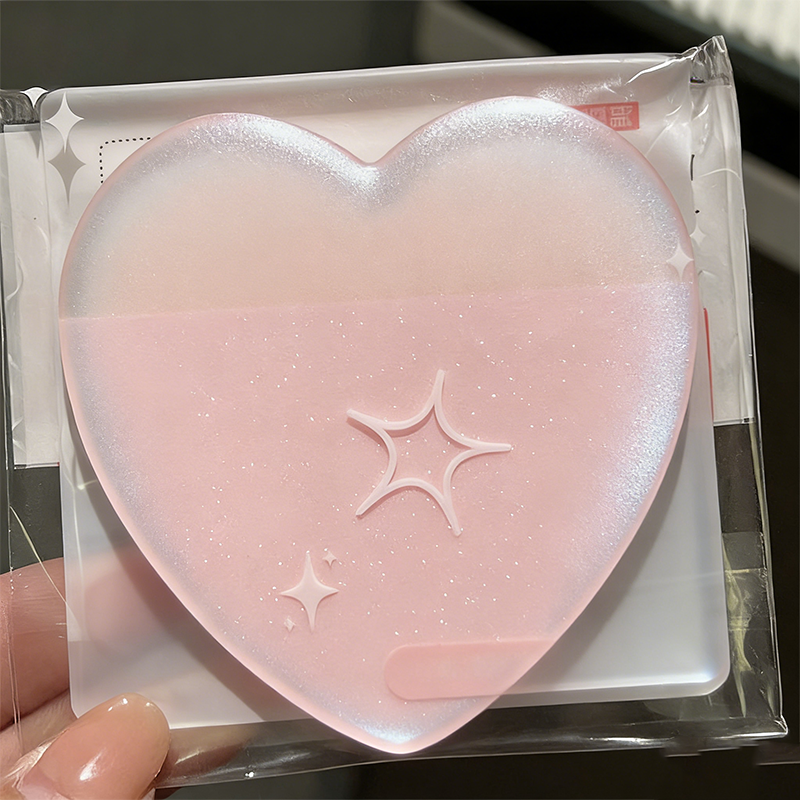A transparent pearlescent heart-shaped sticky notes from Arenzza, featuring a glossy, iridescent finish on a white background.