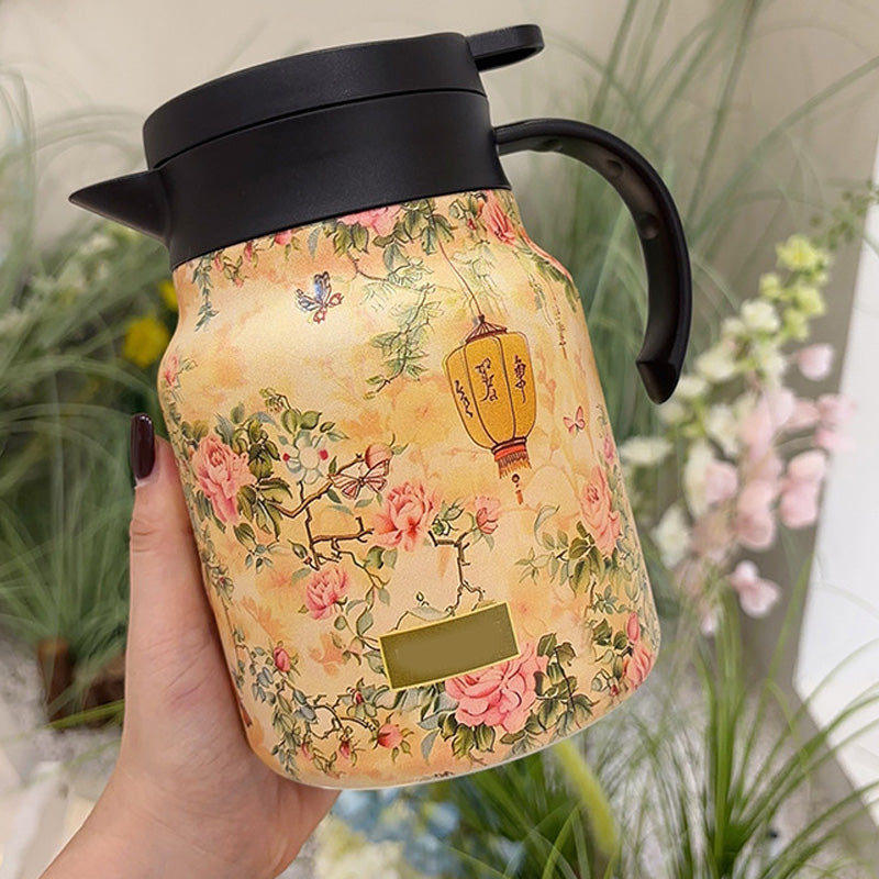 Arenzza 1000ml vacuum insulated teapot with strainer, stainless steel hot beverage container, and leak-proof lid for hot drinks.