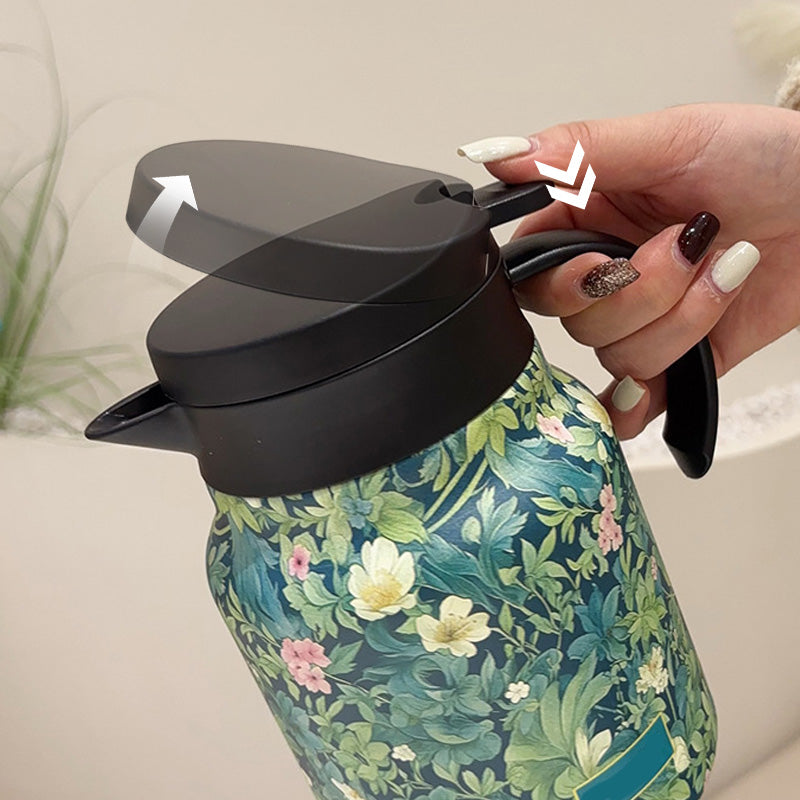 Arenzza 1000ml vacuum insulated teapot with strainer, sleek design, perfect for hot beverages, showcased in a clean setting.