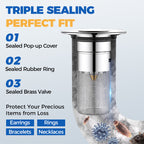 Arenzza universal pop-up sink drain filter catching debris in a household kitchen sink, designed to prevent clogs and easy to clean.