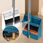 Arenzza stand-up dustpan and brush set with rotating 180° handle for household cleaning, shown in a clean, organized setting.