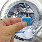 Arenzza washing machine deep cleaner tablets for household cleaning, shown in a container with clean washing machine drum in background.