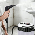 Arenzza adjustable high-pressure steam cleaner for household cleaning, showing the handheld device with steam nozzle and control handle.