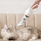 Arenzza handheld pet vacuum in black with three cleaning accessories, lightweight and portable for household pet hair cleaning.