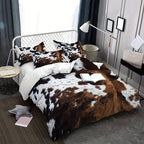 Aarenza cow print duvet cover set with soft, lightweight fabric featuring a fun black and white cow pattern on a bed.