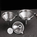 Arenzza stainless steel filter funnel for kitchen use, with a wide mouth and handle for easy pouring and filtering.