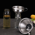 Aarenzza stainless steel filter funnel for kitchen use, with a wide mouth and spout, ideal for pouring and straining liquids.