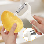 Arenzza 2-in-1 dual-head peeler and shredder for kitchen use, featuring stainless steel blades and ergonomic handle for easy peeling.