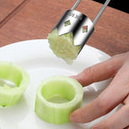 Arenzza Universal Stainless Steel Fruit Core Remover showing a hand holding the kitchen tool with a halved apple.