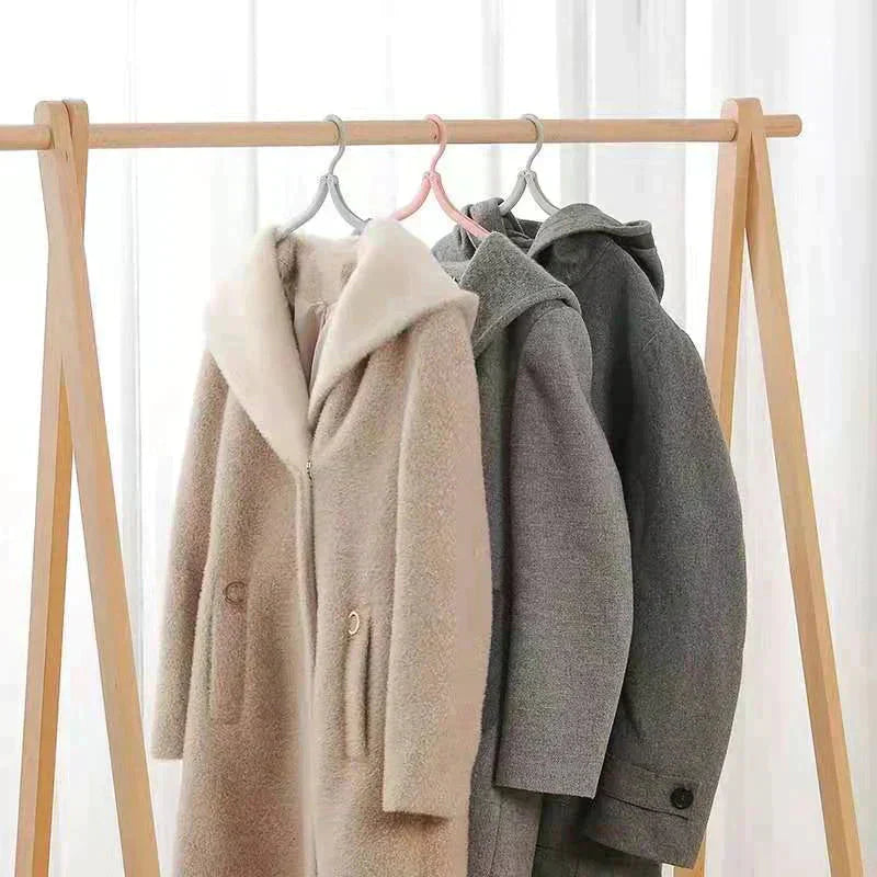 Arenzza foldable portable travel hanger, compact houseware and kitchen accessory, shown unfolded with hanging clips and handle.