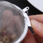 Arenzza 304 stainless steel spice and tea filter set with three mesh filters, ideal for kitchen and brewing use.