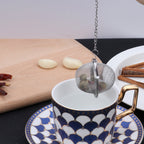 Arenzza 304 stainless steel spice and tea filter set with three mesh filters for kitchen use, shown with close-up of filters.