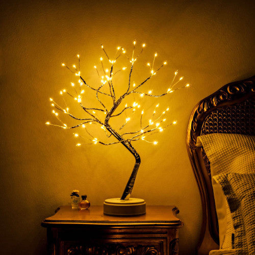 Aarenza glittering Tree of Life decorative houseware piece with intricate branches and shimmering finish.
