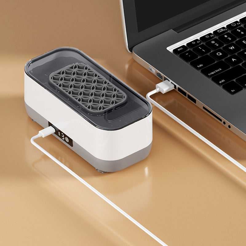 Arenzza portable smart ultrasonic cleaner for kitchen and houseware, showing a compact device with digital controls and cleaning chamber.
