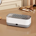 Arenzza portable smart ultrasonic cleaner for household use, showing a compact device with digital display and stainless steel tank.