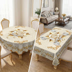 A gold rose waterproof tablecloth from Arenzza, featuring a floral design, spread over a dining table in a kitchen setting.