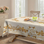 A waterproof gold rose tablecloth from Arenzza, featuring a floral design, perfect for kitchen and houseware use.