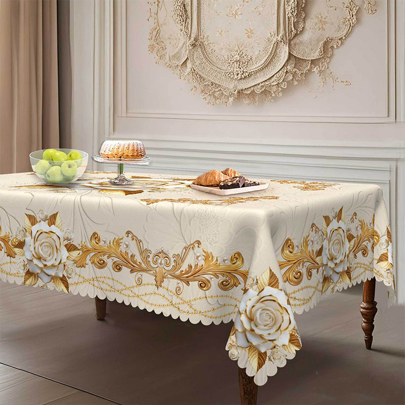 A waterproof gold rose tablecloth by Arenzza, showcasing a luxurious floral design on a smooth, protective kitchen and houseware fabric.