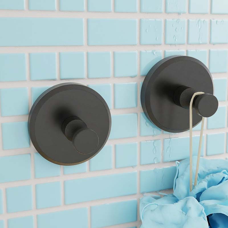 Arenzza stainless steel suction cup hook attached to a wall holding a Christmas wreath in a houseware and kitchen setting.