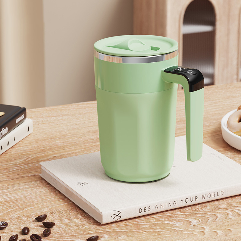 Arenzza 400ML smart self-stirring coffee mug with a sleek design, featuring a button to activate automatic stirring in a kitchen setting.