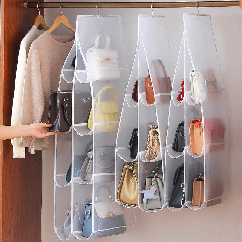 Arenzza hanging handbag dust-proof organizer with 6 large pockets for storing handbags and accessories in the house or kitchen.