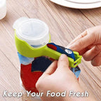 Arenzza Seal and Pour Food Storage Bag Clips shown on a kitchen countertop, used to securely close and pour from food bags.