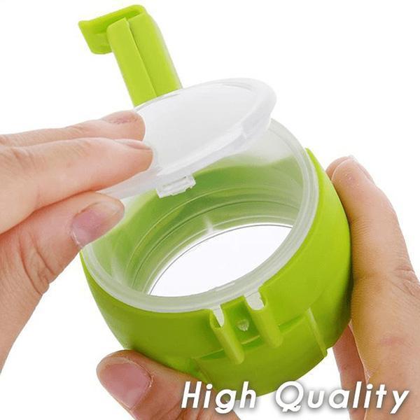 Arenzza seal and pour food storage bag clip held in hand, designed to keep bags sealed and prevent spills in the kitchen.