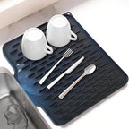 Arenzza No-Spill Silicone Worktop Saver, heat-resistant non-slip mat for drying dishes and preventing spills in the kitchen.