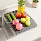 Arenzza no-spill silicone worktop saver mat with heat-resistant, non-slip surface for drying and protecting kitchen countertops.
