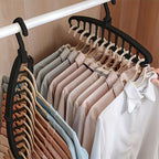 Arenzza foldable clothes hanger with 11 holes, versatile houseware and kitchen accessory, shown in a folded position.