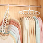 Arenzza multifunctional foldable clothes hanger with 11 holes, made of durable houseware and kitchen material, displayed unfolded.