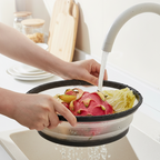 Arenzza collapsible microwave cover with base mat for kitchen, made of durable plastic, shown on a kitchen countertop.