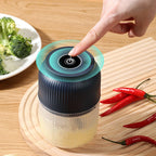 Arenzza cordless mini electric garlic chopper with stainless steel blade, compact kitchen tool, and easy-to-clean design.