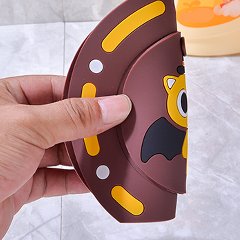 Arenzza anti-clog and odor-proof drain cover for kitchen sinks, showing a sleek black houseware design fitting over a drain.