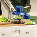 Arenzza transparent electric fruit and vegetable peeler with a sleek design, shown on a kitchen countertop.