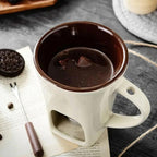 Arenzza chocolate melting cup for houseware and kitchen use, designed for melting and serving chocolate.