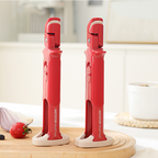 Arenzza multi-purpose anti-scald bowl holder clip for kitchen use, designed to prevent spills and protect hands from hot bowls.