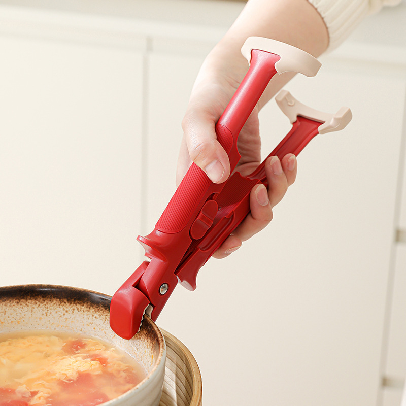 Arenzza multi-purpose anti-scald bowl holder clip securing a kitchen bowl in a houseware setting