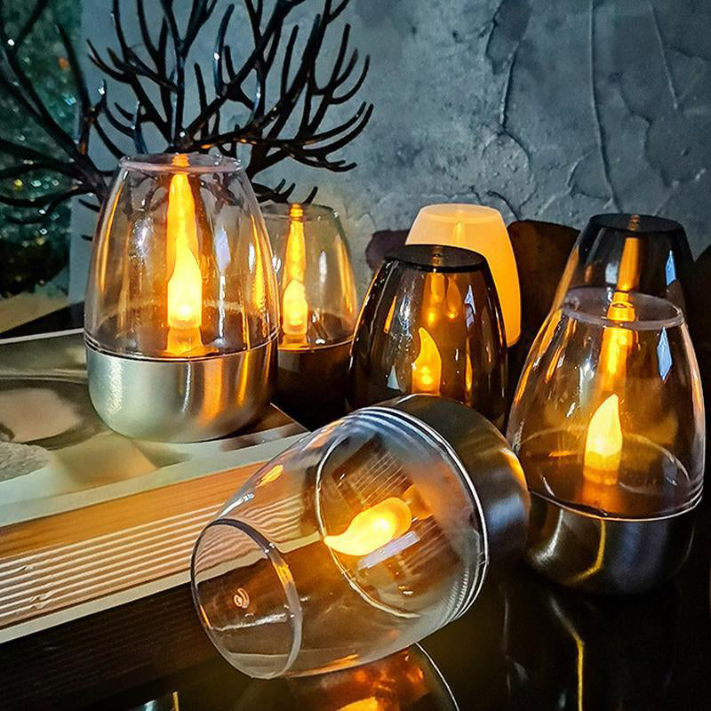 Aarenza solar-powered LED candle light lamp with a glass jar, ideal for houseware and kitchen decor, glowing softly in warm light.