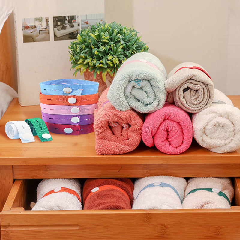 Arenzza bed sheet organizer with elastic bands for easy storage and neat folding of bed sheets in a houseware and kitchen setting.
