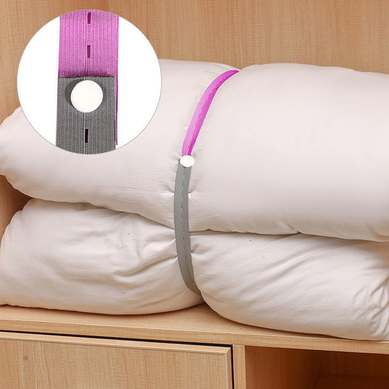Arenzza bed sheet organizer with elastic bands holding neatly folded bedsheets in a home bedroom setting.