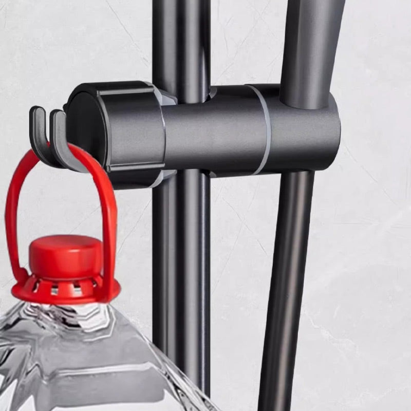 Arenzza no-tool shower holder mounted on a bathroom wall, holding a shower head in a clean, modern bathroom setting.