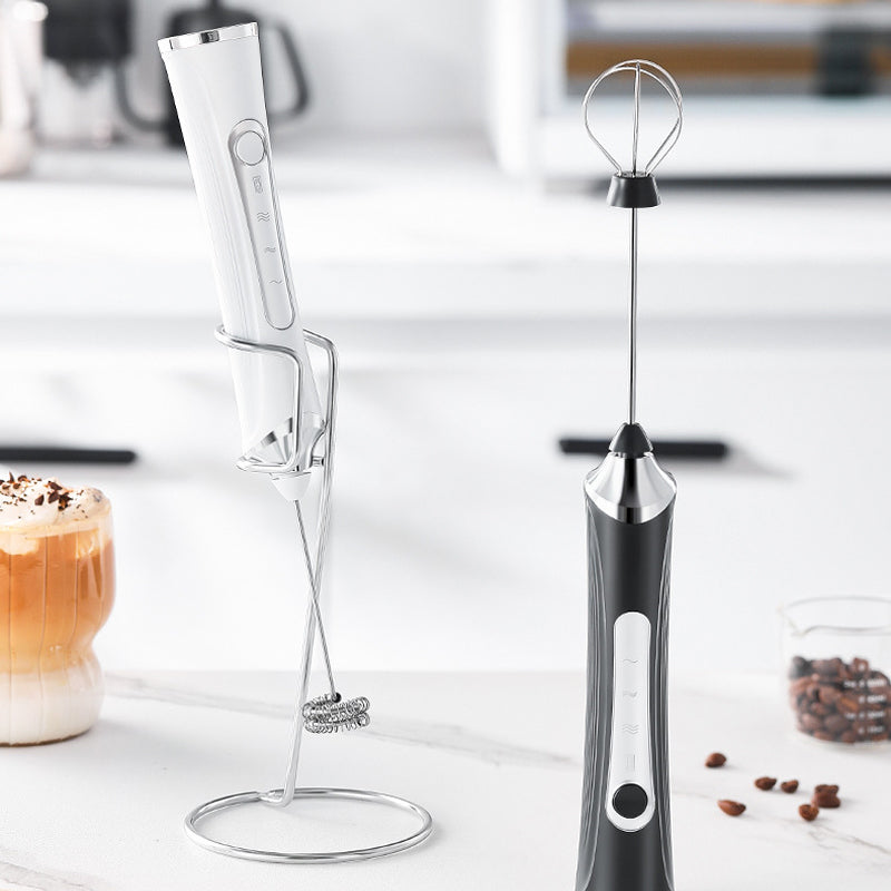 Arenzza mini portable electric frother set for kitchen use, featuring a compact handheld frother with a mixing whisk and power button.
