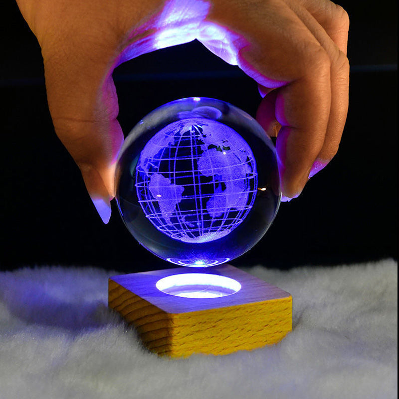 Arenzza 3D Galaxy Crystal Ball Nightlight decor lamp showing a luminous galaxy design in a clear glass sphere.
