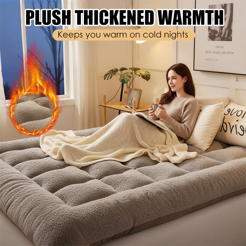Arenzza ultra-warm thickened mattress pad with plush fabric and supportive padding, designed for cozy, restful sleep.