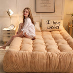 Arenzza thickened mattress pad with plush, cozy surface and strong support for added warmth and comfort in the bedroom.