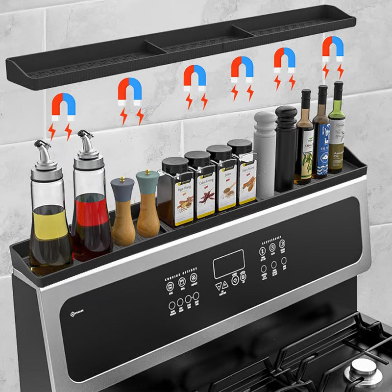 Arenzza magnetic silicone kitchen rack attached to a wall, holding utensils and kitchen tools in a modern houseware setting.