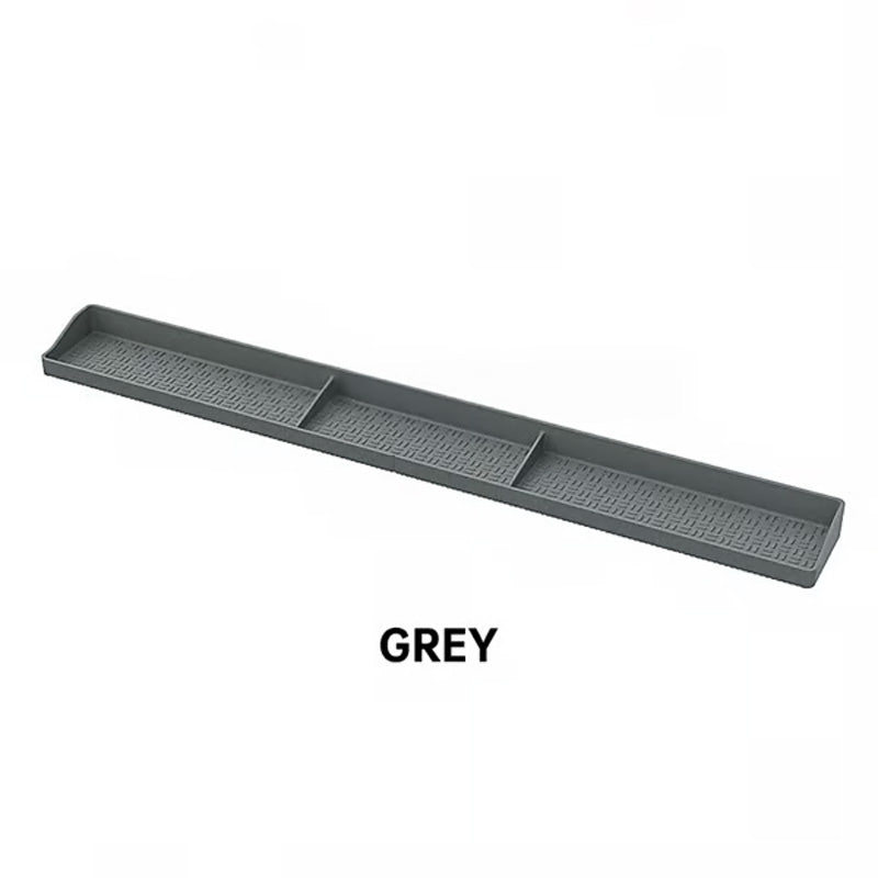 Arenzza magnetic silicone kitchen rack mounted on a wall, holding kitchen utensils and accessories in a modern houseware setting.