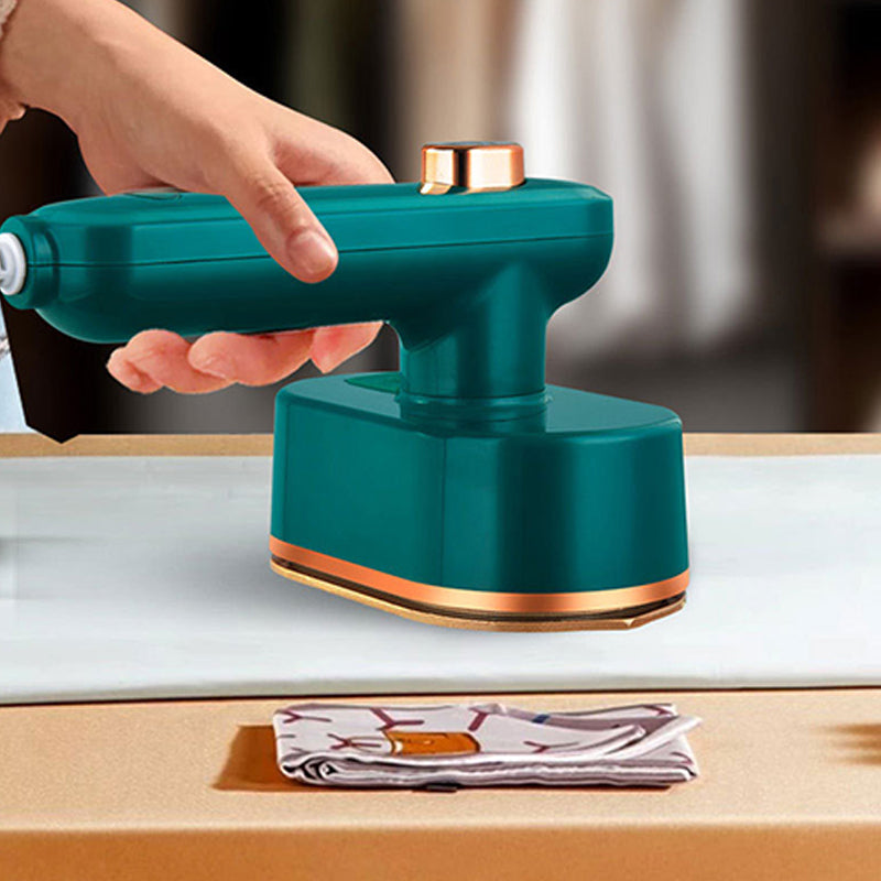 Aarenza portable mini steam iron for houseware and kitchen, shown steaming fabric with a compact design and ergonomic handle.